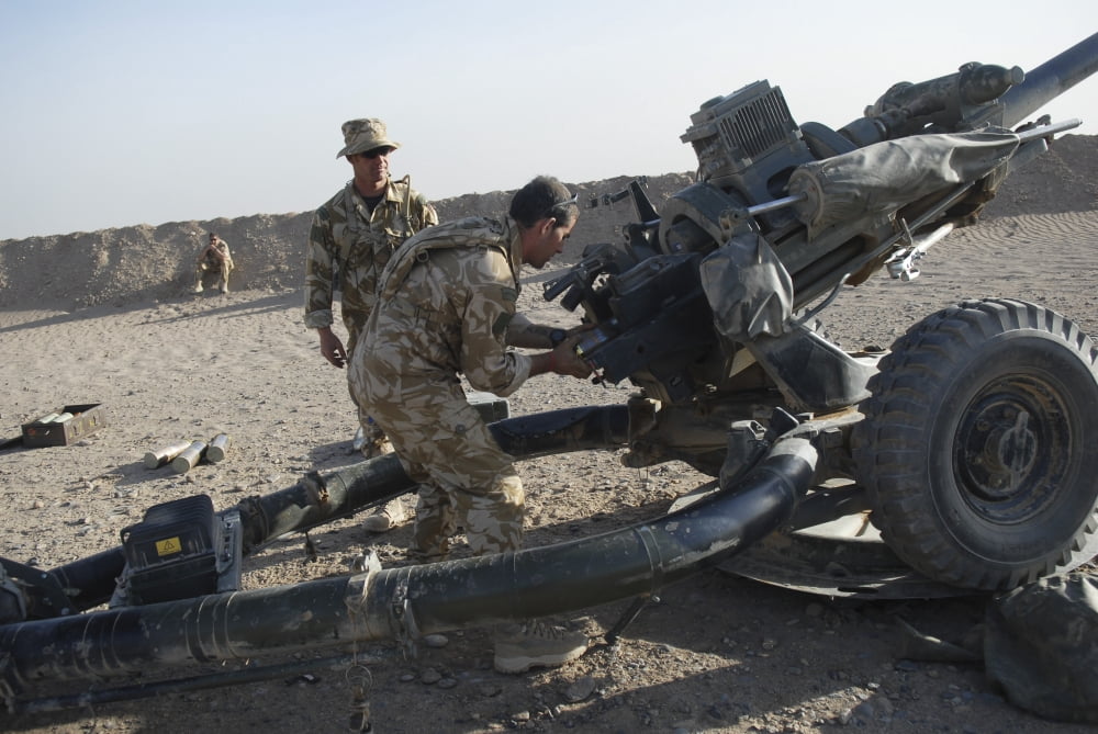 British soldiers test fire a Howitzer 105mm light gun Canvas Art - Andrew ChittockStocktrek Images (17 x 12)