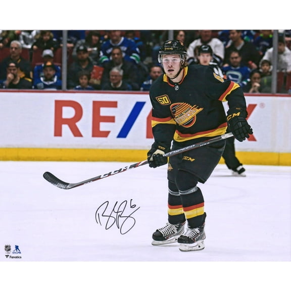 Brock Boeser Vancouver Canucks Autographed 16" x 20" Black Jersey Skating Photograph - Fanatics Authentic Certified
