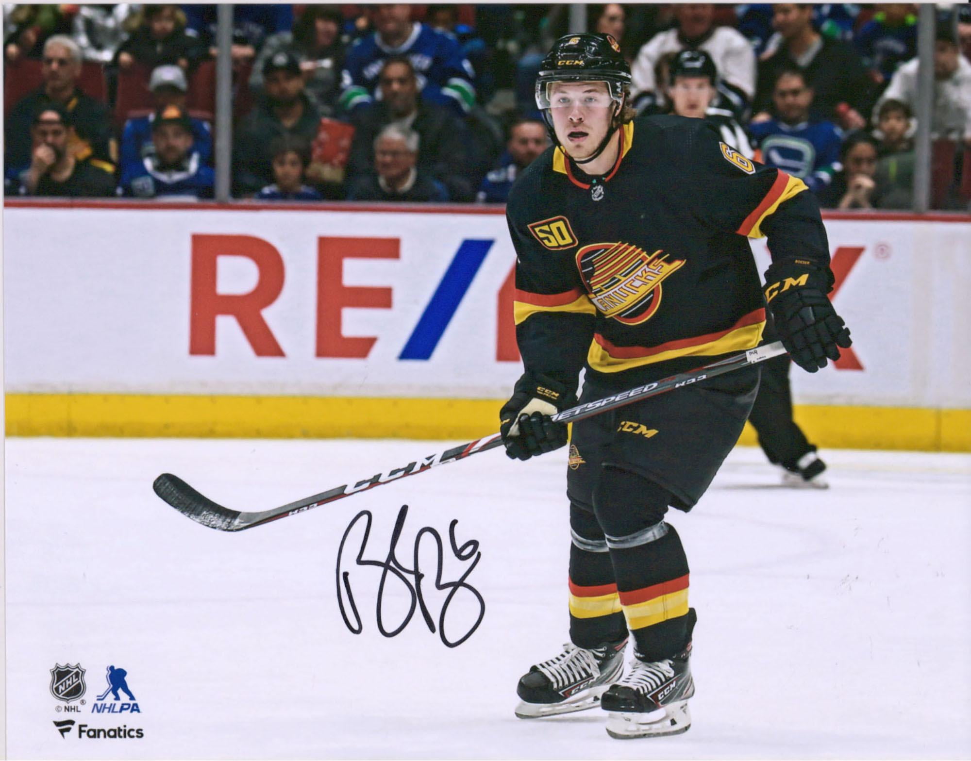 Brock Boeser Vancouver Canucks Autographed 8" x 10" Black Jersey Skating Photograph - Fanatics Authentic Certified