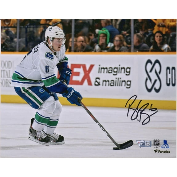 Brock Boeser Vancouver Canucks Autographed 8" x 10" White Jersey Skating with Puck Photograph - Fanatics Authentic Certified