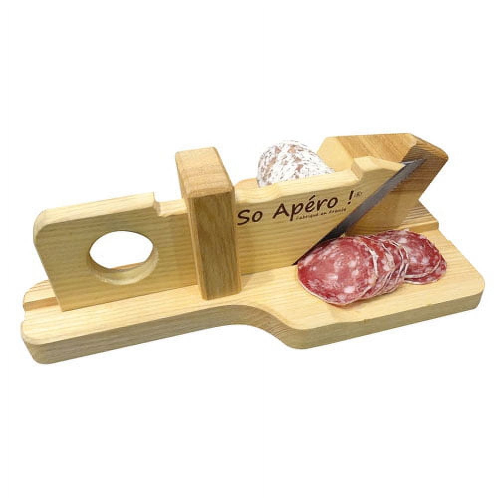 The slicer cuts the whole salami into pieces in a matter of seconds.