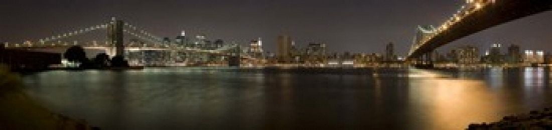 Brooklyn Bridge and Manhattan Bridge across East River at night Manhattan New York City New York State USA Canvas Art - Panoramic Images (20 x 5)