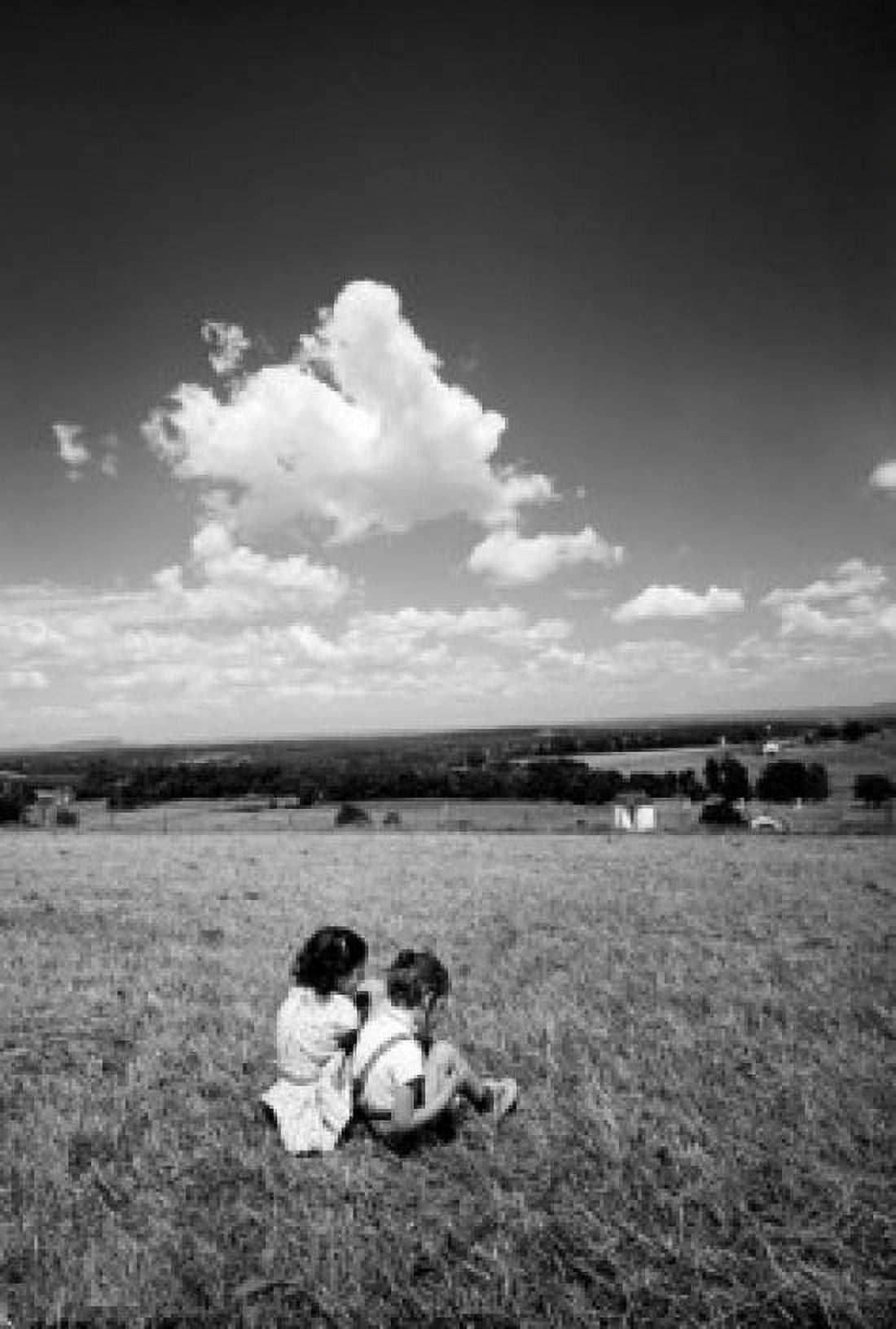 Brother and sister sitting on pasture high angle view Canvas Art - (24 x 36)