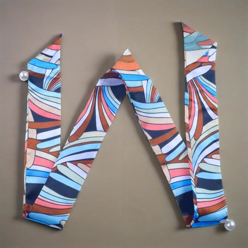 Brown, white, blue and pink in an alternating pattern alternating ...