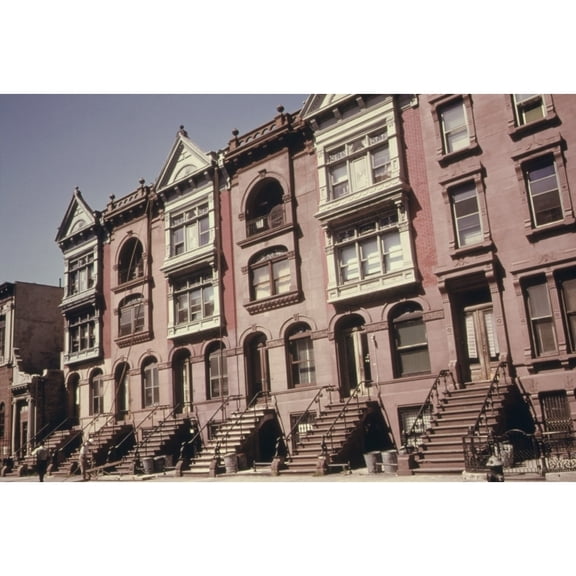 Brownstone Apartments Under Renovation In Brooklyn. The Turn Of The Century Buildings Are Faced With Brown Sandstone.