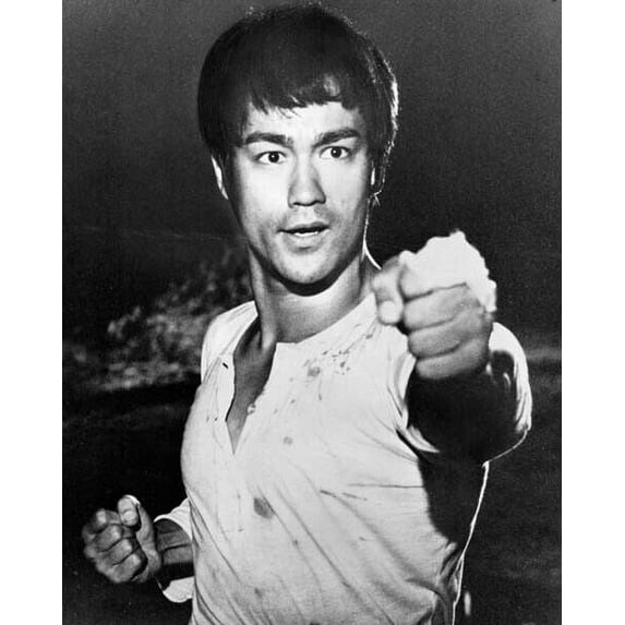 Bruce Lee packs a powerful punch in 1972 Fists of Fury 8x10 inch photo