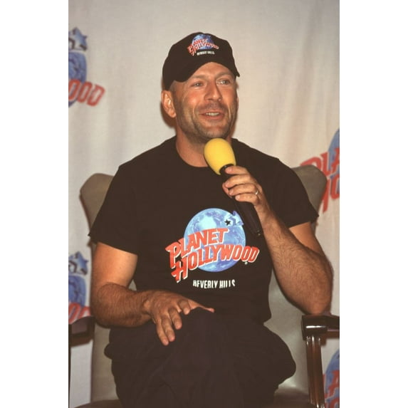 Bruce Willis Speaking On Stage At Planet Hollywood Event Photo Print (16 x 20) - Item # CPA3807