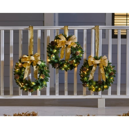 BrylaneHome Set of 3 Pre-Lit 16 inch Christmas Wreaths with 20 Warm Lights & Timer Function, Pre-Decorated, Cordless, No Outlet Required
