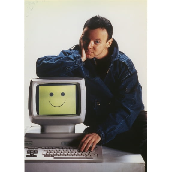Bud Cort sitting in White Background Photo Print (8 x 10)