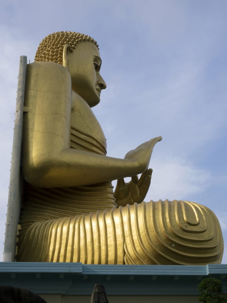 Buddha statue atop Golden Temple museum at Dambulla Central Province Sri Lanka Canvas Art - Panoramic Images (12 x 16)