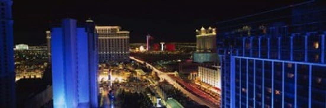 Buildings Lit Up At Night Las Vegas Nevada USA Canvas Art - Panoramic Images (18 x 6)