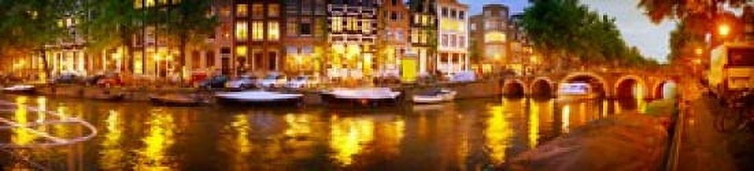 Buildings along a canal at dusk Amsterdam Netherlands Canvas Art - Panoramic Images (20 x 5)
