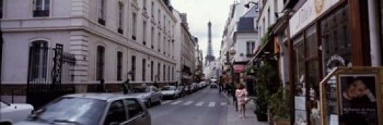 Buildings along a street with the Eiffel Tower in the background Paris France Canvas Art - Panoramic Images (36 x 12)