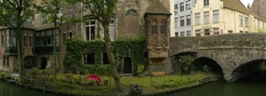 Buildings along channel Bruges West Flanders Belgium Canvas Art - Panoramic Images (18 x 7)
