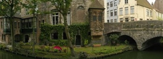 Buildings along channel Bruges West Flanders Belgium Canvas Art - Panoramic Images (36 x 13)
