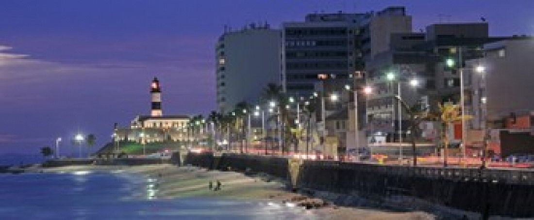 Buildings at Porto Da Barra Beach with Forte De Santo Antonio Lighthouse at evening Salvador Bahia Brazil Canvas Art - Panoramic Images (30 x 13)