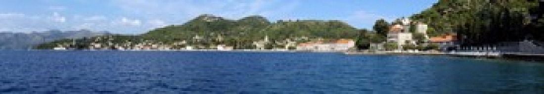 Buildings at the waterfront Adriatic Sea Lopud Island Dubrovnik Croatia Canvas Art - Panoramic Images (22 x 4)