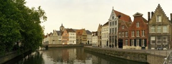 Buildings at the waterfront Bruges West Flanders Belgium Canvas Art - Panoramic Images (36 x 13)