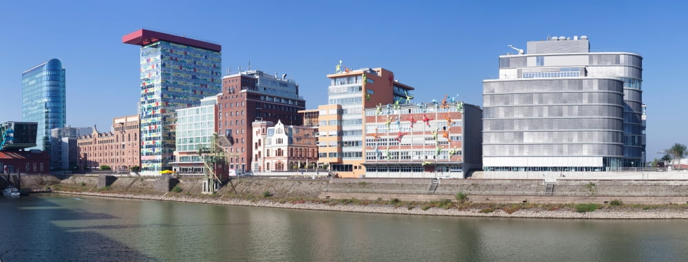Buildings at the waterfront Colorium Media Harbour Dusseldorf North Rhine Westphalia Germany Canvas Art - Panoramic Images (27 x 9)