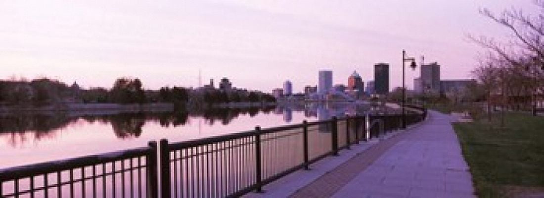 Buildings at the waterfront Genesee Rochester Monroe County New York State USA Canvas Art - Panoramic Images (18 x 7)