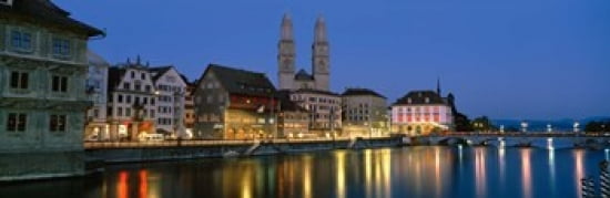 Buildings at the waterfront Grossmunster Cathedral Zurich Switzerland Canvas Art - Panoramic Images (36 x 12)