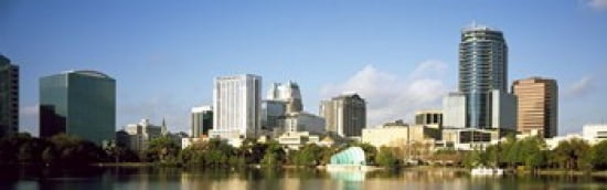 Buildings at the waterfront Lake Eola Orlando Orange County Florida USA 2010 Canvas Art - Panoramic Images (36 x 12)