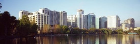 Buildings at the waterfront Lake Eola Orlando Orange County Florida USA Canvas Art - Panoramic Images (36 x 12)