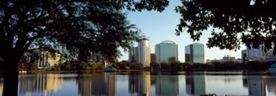 Buildings at the waterfront Lake Eola Orlando Orange County Florida USA Canvas Art - Panoramic Images (36 x 13)