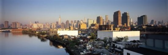 Buildings at the waterfront Midtown Manhattan Manhattan New York City New York State USA Canvas Art - Panoramic Images (36 x 12)