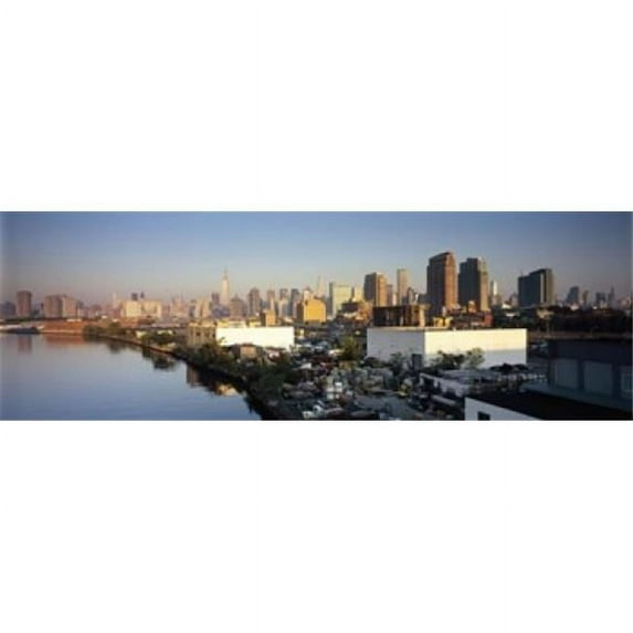 Buildings at the waterfront, Midtown Manhattan, Manhattan, New York City, New York State, USA Poster Print (36 x 12)
