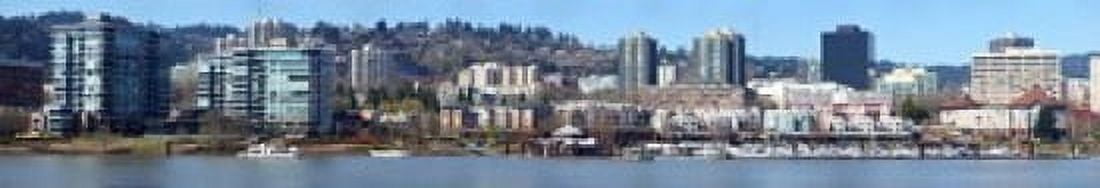 Buildings at the waterfront Portland Multnomah County Oregon USA 2011 Canvas Art - Panoramic Images (22 x 4)