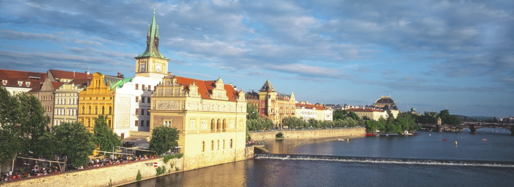 Buildings at the waterfront Prague Czech Republic Canvas Art - Panoramic Images (27 x 9)