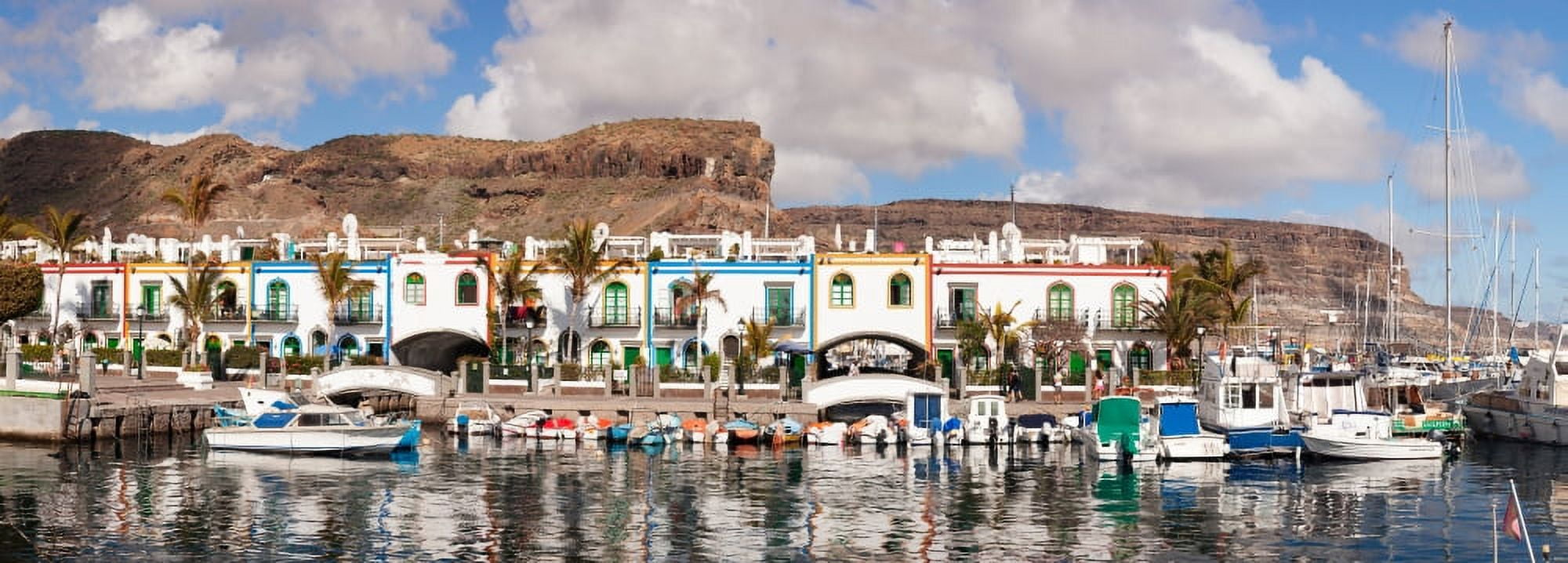 Buildings at the waterfront Puerto de Mogan Gran Canaria Spain Canvas Art - Panoramic Images (27 x 9)