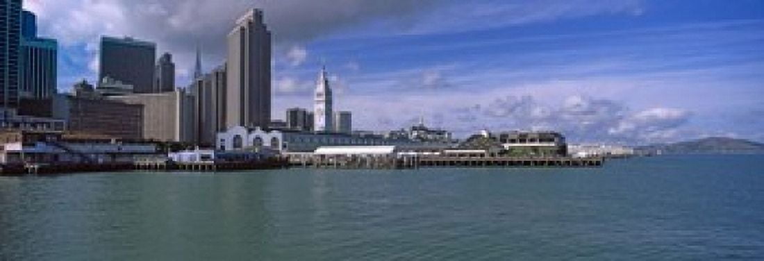 Buildings at the waterfront San Francisco California USA Canvas Art - Panoramic Images (18 x 7)