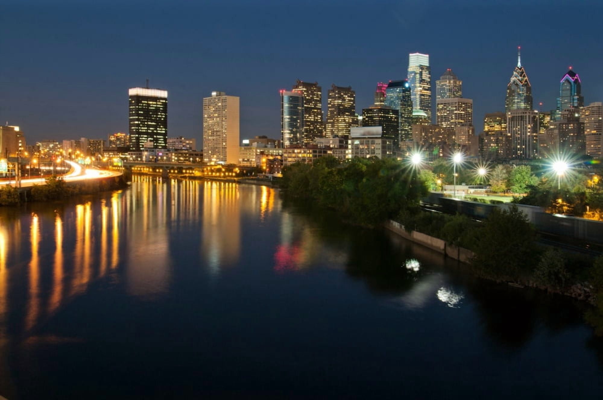 Buildings at the waterfront at night River Delaware Philadelphia Pennsylvania USA Canvas Art - Panoramic Images (9 x 27)