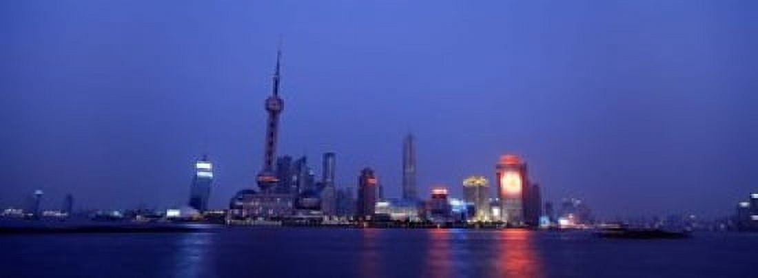 Buildings at the waterfront lit up at dusk Pudong Shanghai China Canvas Art - Panoramic Images (18 x 7)