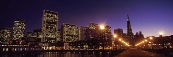 Buildings at the waterfront lit up at dusk San Francisco California USA Canvas Art - Panoramic Images (36 x 12)
