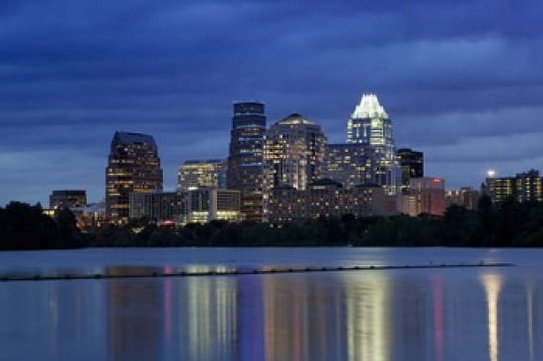 Buildings at the waterfront lit up at dusk Town Lake Austin Texas USA Canvas Art - Panoramic Images (24 x 18)