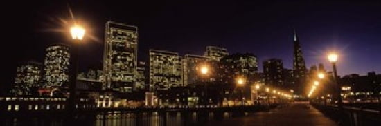 Buildings at the waterfront lit up at night San Francisco California USA Canvas Art - Panoramic Images (36 x 12)