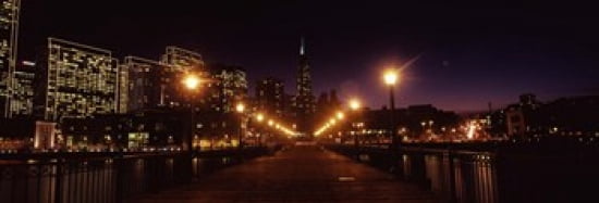 Buildings at the waterfront lit up at night San Francisco California USA Canvas Art - Panoramic Images (36 x 13)