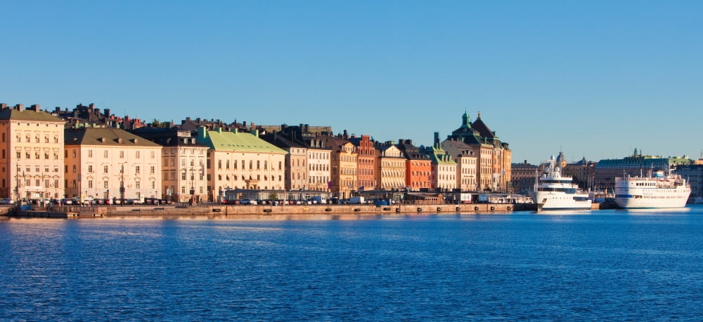 Buildings at waterfront Gamla Stan Stockholm Sweden Canvas Art - Panoramic Images (27 x 9)