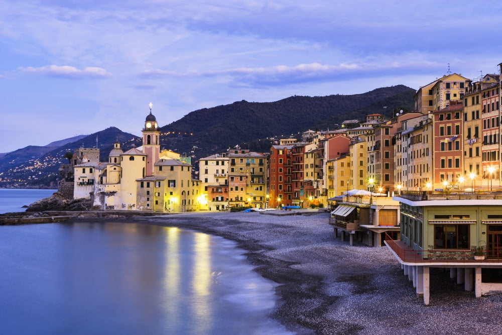 Buildings illuminated by lights along the waters edge at sunrise Camogli Liguria Italy Canvas Art - Yves Marcoux Design Pics (38 x 24)
