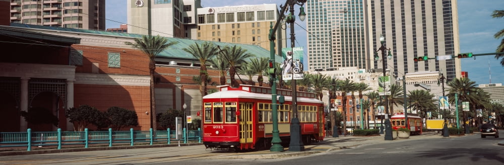 Buildings in a city Canal Street Bourbon Street New Orleans Louisiana USA Canvas Art - Panoramic Images (36 x 12)