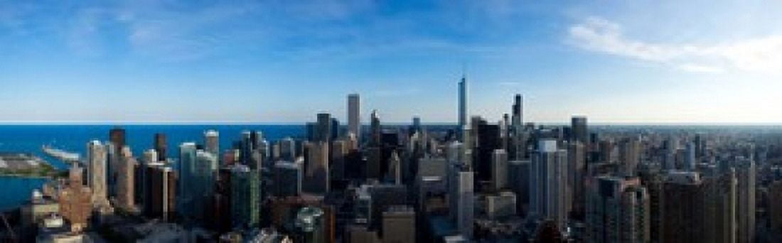 Buildings in a city Chicago Cook County Illinois USA 2010 Canvas Art - Panoramic Images (18 x 6)