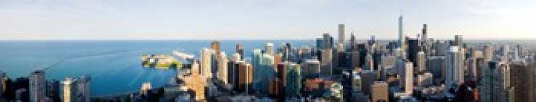 Buildings in a city Chicago Cook County Illinois USA 2010 Canvas Art - Panoramic Images (22 x 4)