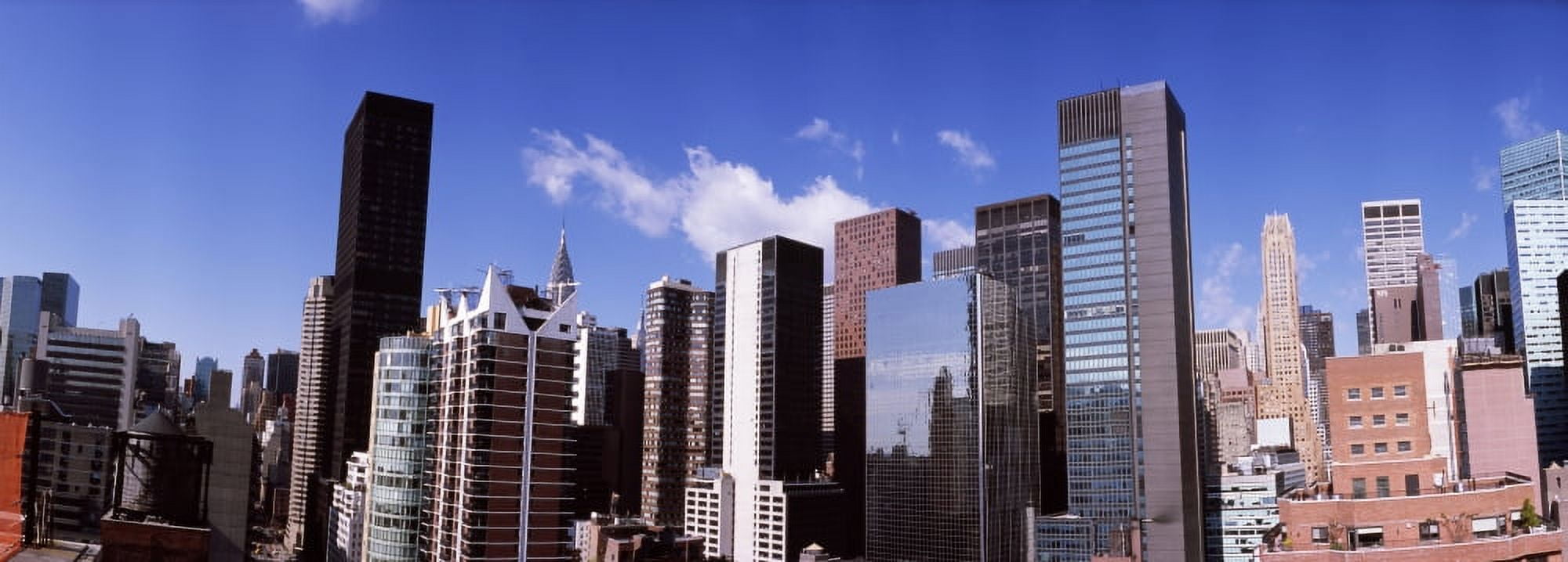 Buildings in a city New York City New York State USA Canvas Art - Panoramic Images (27 x 9)