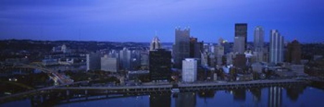 Buildings in a city at dusk Monongahela River Pittsburgh Pennsylvania USA Canvas Art - Panoramic Images (18 x 6)