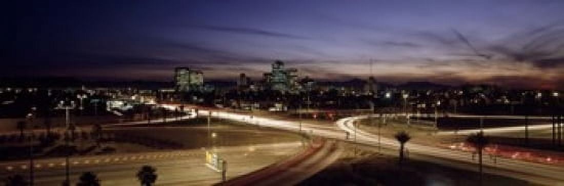 Buildings in a city lit up at dusk 7th St Freeway Phoenix Maricopa County Arizona USA Canvas Art - Panoramic Images (18 x 6)
