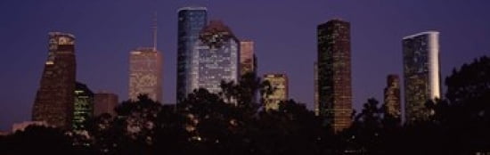 Buildings in a city lit up at dusk Houston Harris county Texas USA Canvas Art - Panoramic Images (36 x 12)