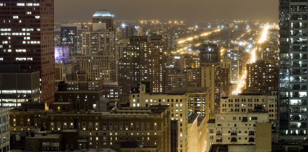 Buildings in a city lit up at night Chicago South Loop Chicago Illinois USA Canvas Art - Panoramic Images (36 x 12)